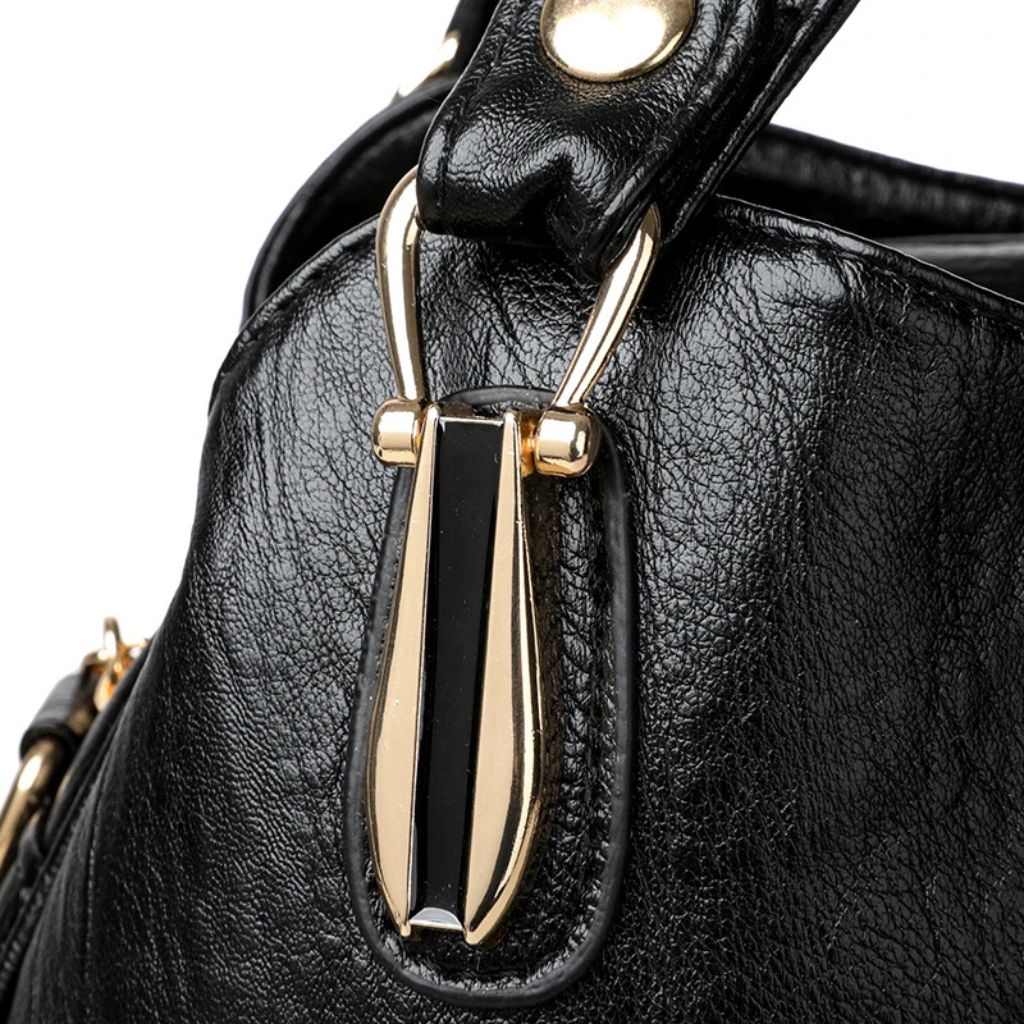 Bolsa Tiracolo Bella Aura™